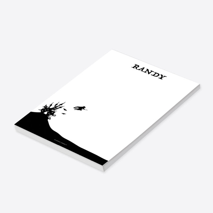 personalized haunted house notepad with haunted mansion silhouette on a hill, bats, flying witch, custom name and blank writing space-side