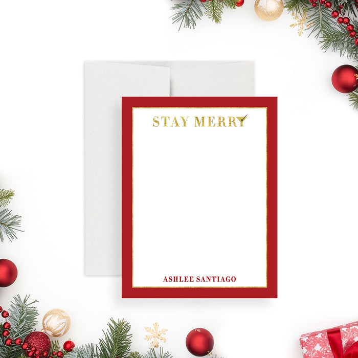 personalized stay merry holiday note card with elegant red border and gold festive lettering-front