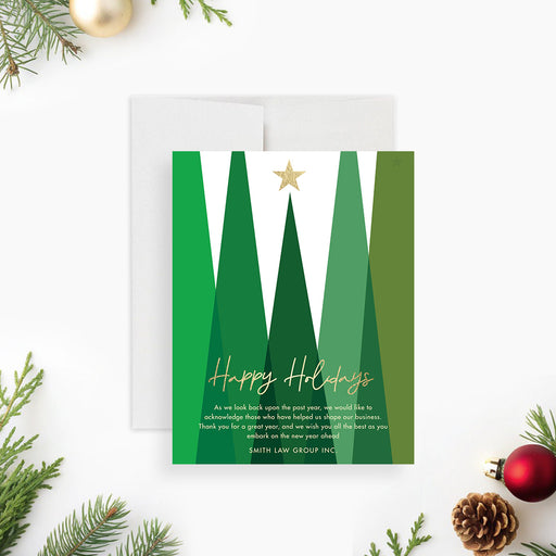 Corporate holiday greeting card with modern green trees, a gold star and personalized company holiday message-front