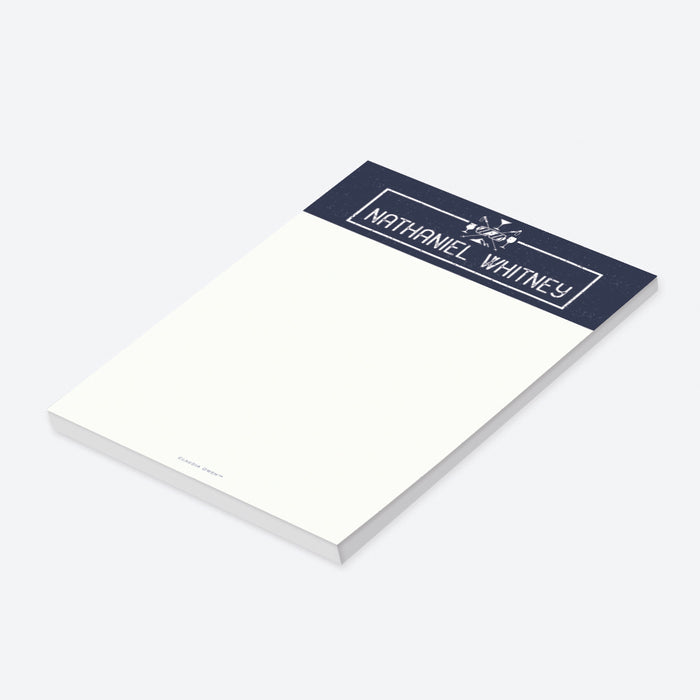 personalized holiday notepad with navy blue header, winter cocktail icons, custom name, and blank writing space-side