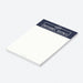 personalized holiday notepad with navy blue header, winter cocktail icons, custom name, and blank writing space-side