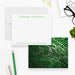 Front and back of personalized note cards with a name in green and professional contact details and a green computer code patterned back.