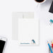 White personalized judo note card with two judokas, beside a blue back featuring the same martial arts illustration.