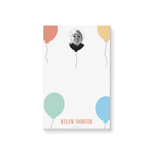 Kids' personalized notepad featuring a custom photo and a pastel balloon illustration