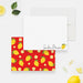 Personalized lemon note cards with a white writing front and a red reverse patterned with yellow lemons and green leaves.