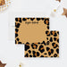 Tan personalized note card framed with black leopard spots, beside a matching leopard-print back.