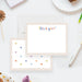 White thank you note card with a pale scalloped border and colorful lettering, beside a back patterned with tiny multicolored hearts.