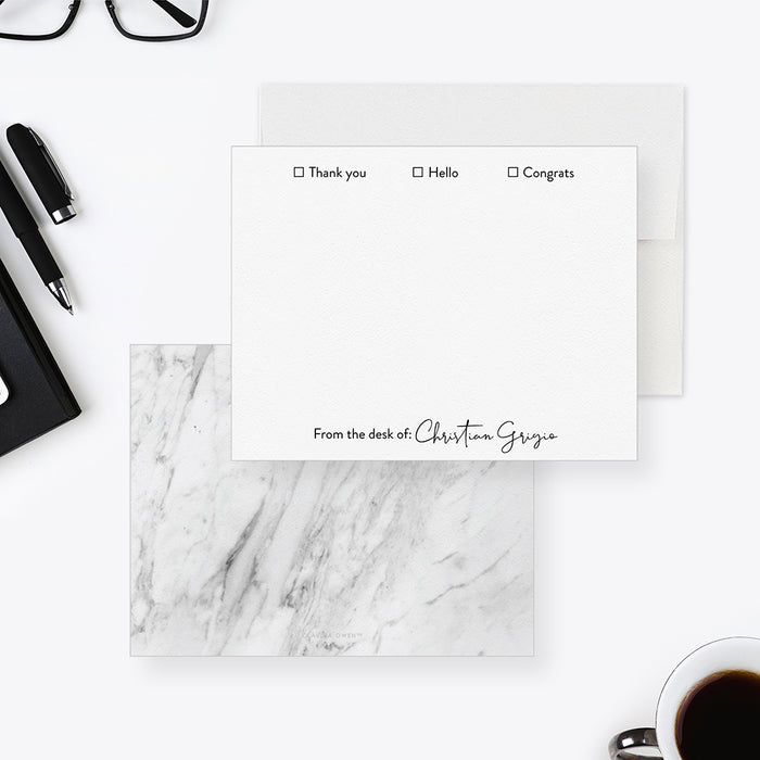 Personalized white note cards with thank you, hello and congrats checkboxes and a gray marble-patterned reverse.