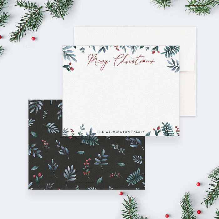 Personalized Merry Christmas note card with red script lettering, watercolor greenery and berries, shown with a white envelope-front-back