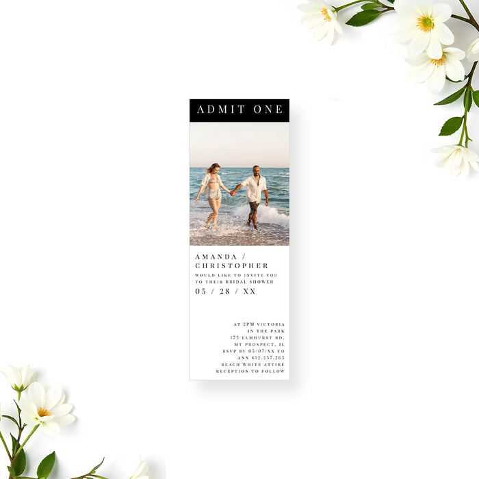 Ticket invitation card with a couple on a beach and floral decorations.