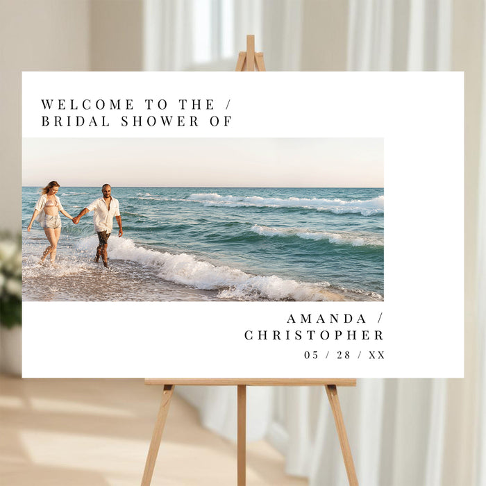 Bridal shower invitation with a couple on a beach
