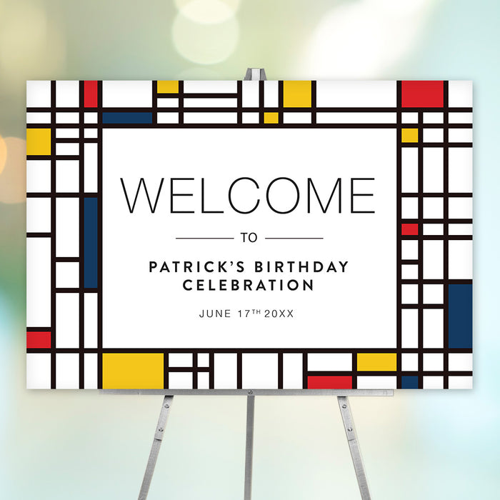 Mondrian-inspired birthday welcome sign with navy, red and yellow geometric artwork, customizable for Patrick's birthday celebration displayed on an easel.