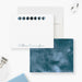 Personalized moon phase note cards with blue lunar illustrations on the white writing front and a blue starry sky reverse.