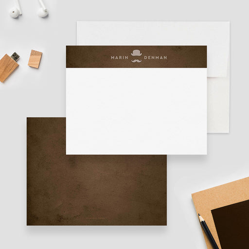 Personalized note cards with a top hat and mustache illustration on a brown band above the white writing area and a textured brown print reverse.