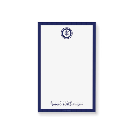 personalized nautical notepad with navy blue border, ship wheel emblem, and custom name for a baby shower gift