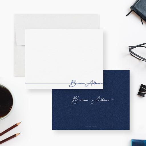 Personalized navy and white note cards with a flowing script name on the white front and navy reverse.