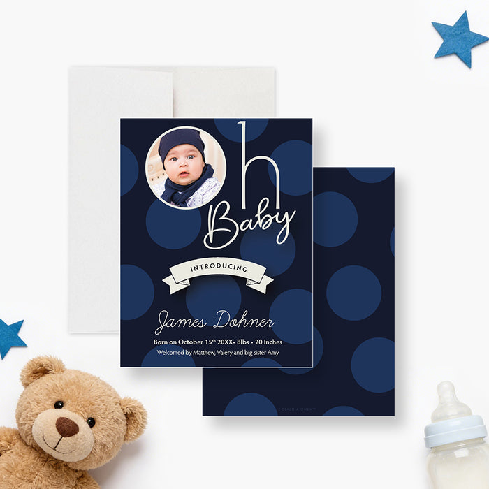 Personalized navy blue polka dot baby boy photo birth announcement with circular newborn photo, name, birth date, weight, length and family names-front-back