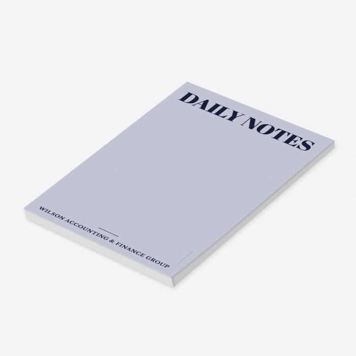 custom business notepad with Daily Notes heading, company name, navy lettering, light blue background, and blank writing space-side