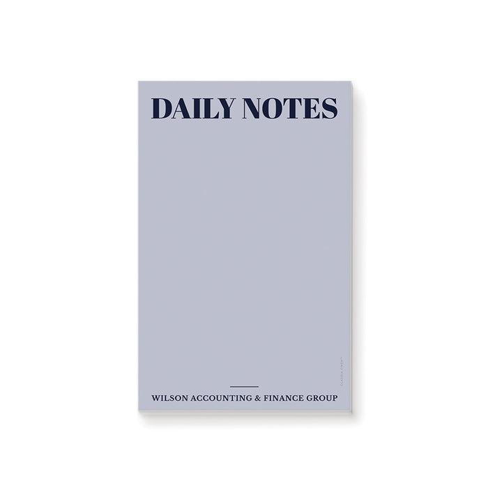 custom business notepad with Daily Notes heading, company name, navy lettering, light blue background, and blank writing space