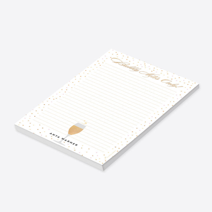 Champagne celebration notepad with confetti dot design and bubbly notes lettering for party planning and personalized stationery.-side