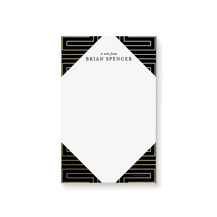 Black and gold notepad with a customizable name printed on premium white paper for professional and corporate use.