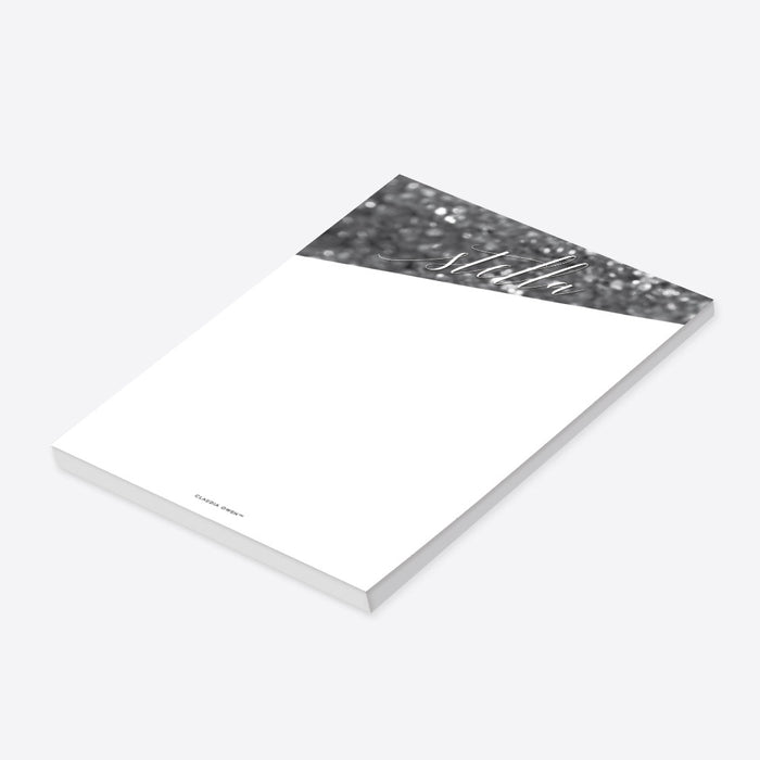 Personalized black and white notepad with bokeh design, name in elegant script lettering, and blank writing area-side