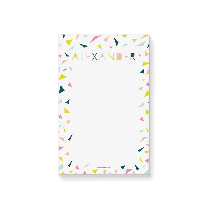 Personalized name notepad with colorful confetti and lettering, perfect as a gift or party favor for kids and adults.