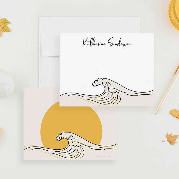 Front and back of personalized note cards with a wave line drawing and a personalized name and a wave and yellow sun design on the back.