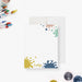 Personalized note card with colorful paint splatters around a white writing area, shown with a white envelope.