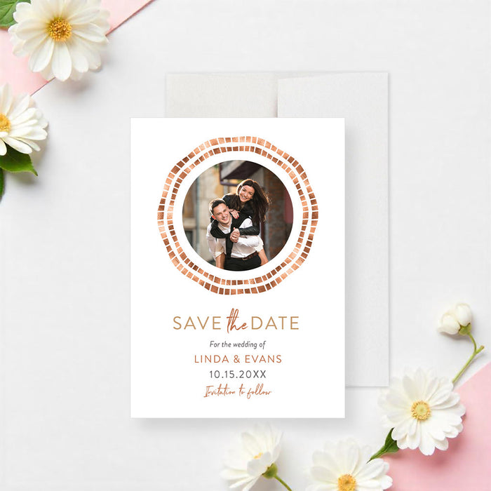 Personalized photo wedding save the date card with circular couple photo, double geometric mosaic border, names, wedding date and warm copper accents-front