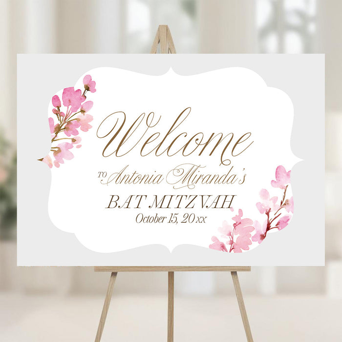 Personalized pink watercolor floral Bat Mitzvah welcome sign with custom honoree’s name, event date and blossom accents
