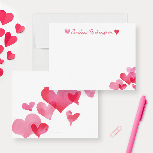Personalized white note cards with a name and pink watercolor hearts on the front and a pink watercolor heart cluster on the reverse.