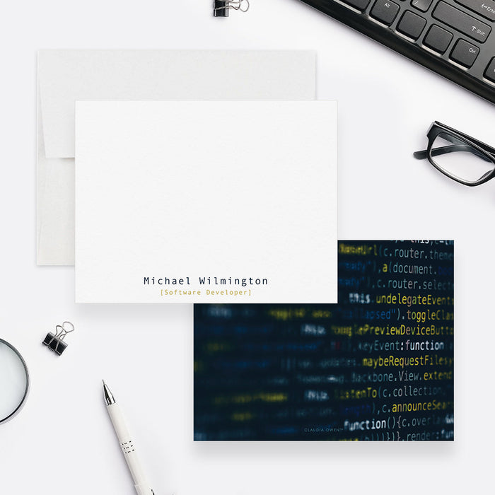 Front and back of personalized note cards with a personalized name and job title and a dark computer code patterned back.