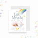 Rainbow baby birth announcement card with Our Little Miracle Has Arrived wording, colorful rainbow, baby photo, raindrops, yellow footprints and birth details-front