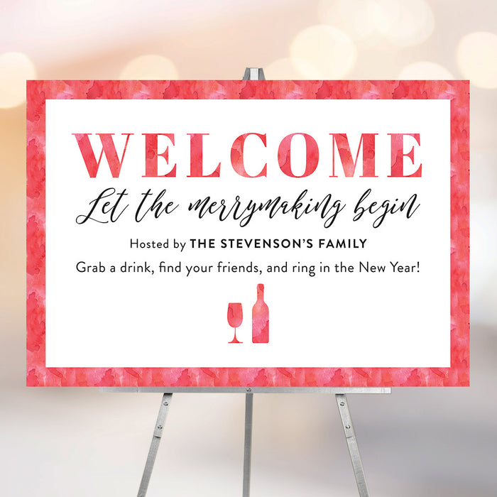 Personalized red watercolor New Year’s Eve party welcome sign with Let the Merrymaking Begin wording, host family name, wine glass and bottle