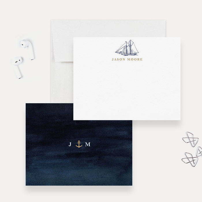 Personalized sailboat note card with a blue sailing ship and name, plus a navy monogram reverse with printed gold anchor-front-back