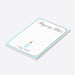 Personalized lined shopping list notepad with Shopping Notes heading, custom name, pale blue border and small champagne bottle-side