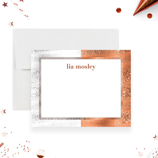 Personalized note card with a white writing area in a printed silver and warm neutral geometric frame with a name at the top. Shown with a white envelope.
