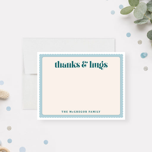 Personalized baby thank you note card with blue border, Thanks and Hugs message and custom family name-front
