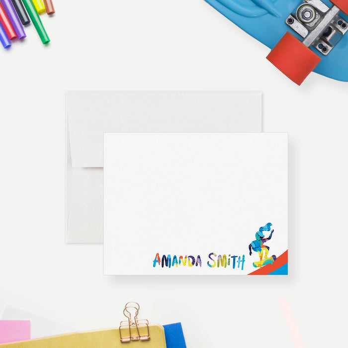 Personalized note card with a girl skateboarder illustration and colorful name lettering, shown with a white envelope.