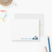 Personalized note card with a snowmobile rider illustration and a personalized name, shown with a white envelope.