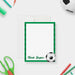 Personalized note card with a soccer ball, green frame and a personalized name, shown with a white envelope.