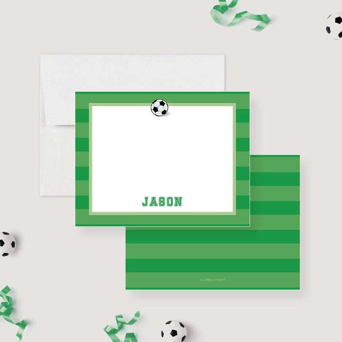 Personalized soccer note card with a black-and-white soccer ball, green striped border, white writing space, and custom name.