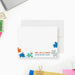 Personalized note card with colorful puzzle pieces, a personalized name and job title, shown with a white envelope.