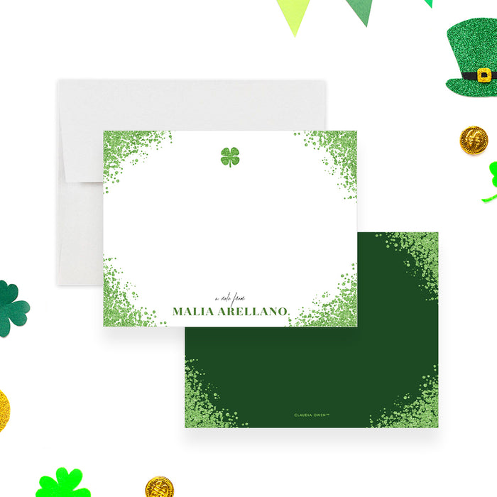 Personalized St. Patrick's Day note card with a green speckled border, four-leaf clover, custom name and blank writing area-front-back