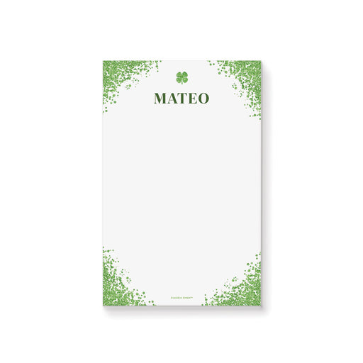 Personalized St. Patrick's Day notepad with a green speckled border, four-leaf clover, custom name and blank writing area