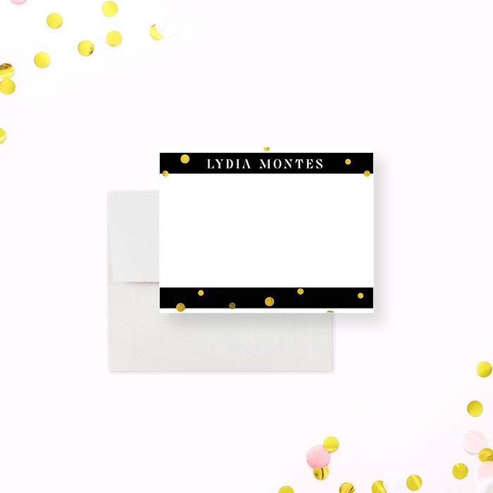 Personalized note card with a white front with black header and footer bands, printed gold confetti, and a name. Shown with a white envelope.