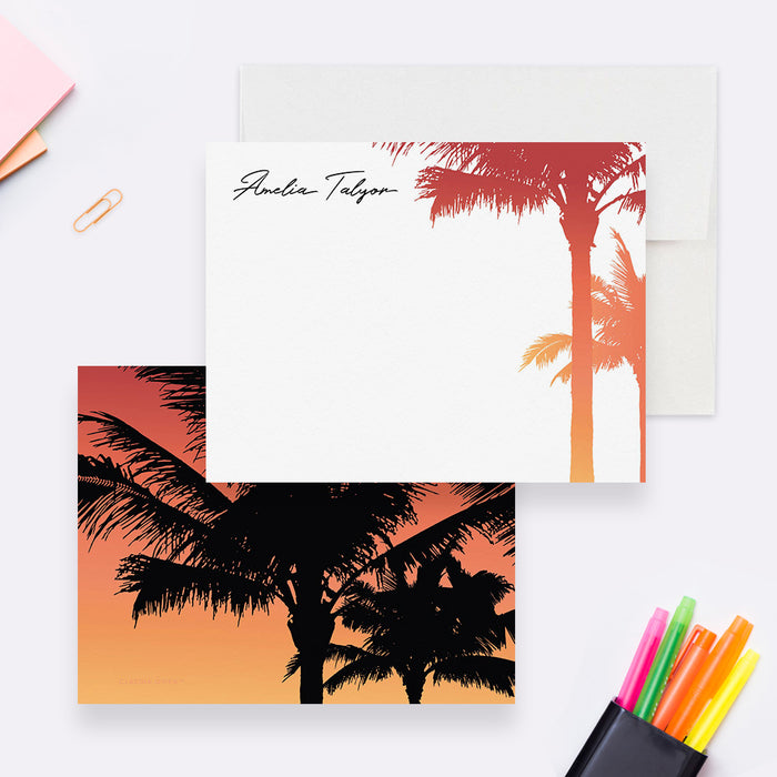 Personalized note cards with sunset-colored palm trees around the white front and black palm silhouettes on the reverse.