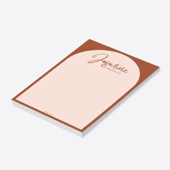 personalized terracotta arch notepad with custom name, blush writing area, warm rust border, and minimalist stationery design-side