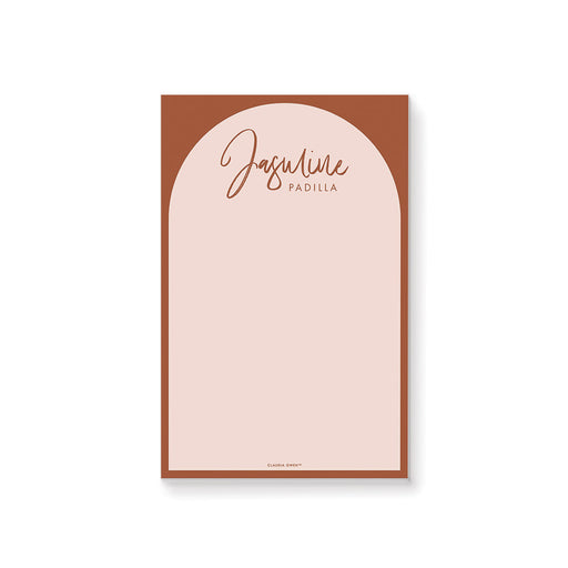 personalized terracotta arch notepad with custom name, blush writing area, warm rust border, and minimalist stationery design